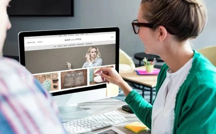 Woman shopping at laptop